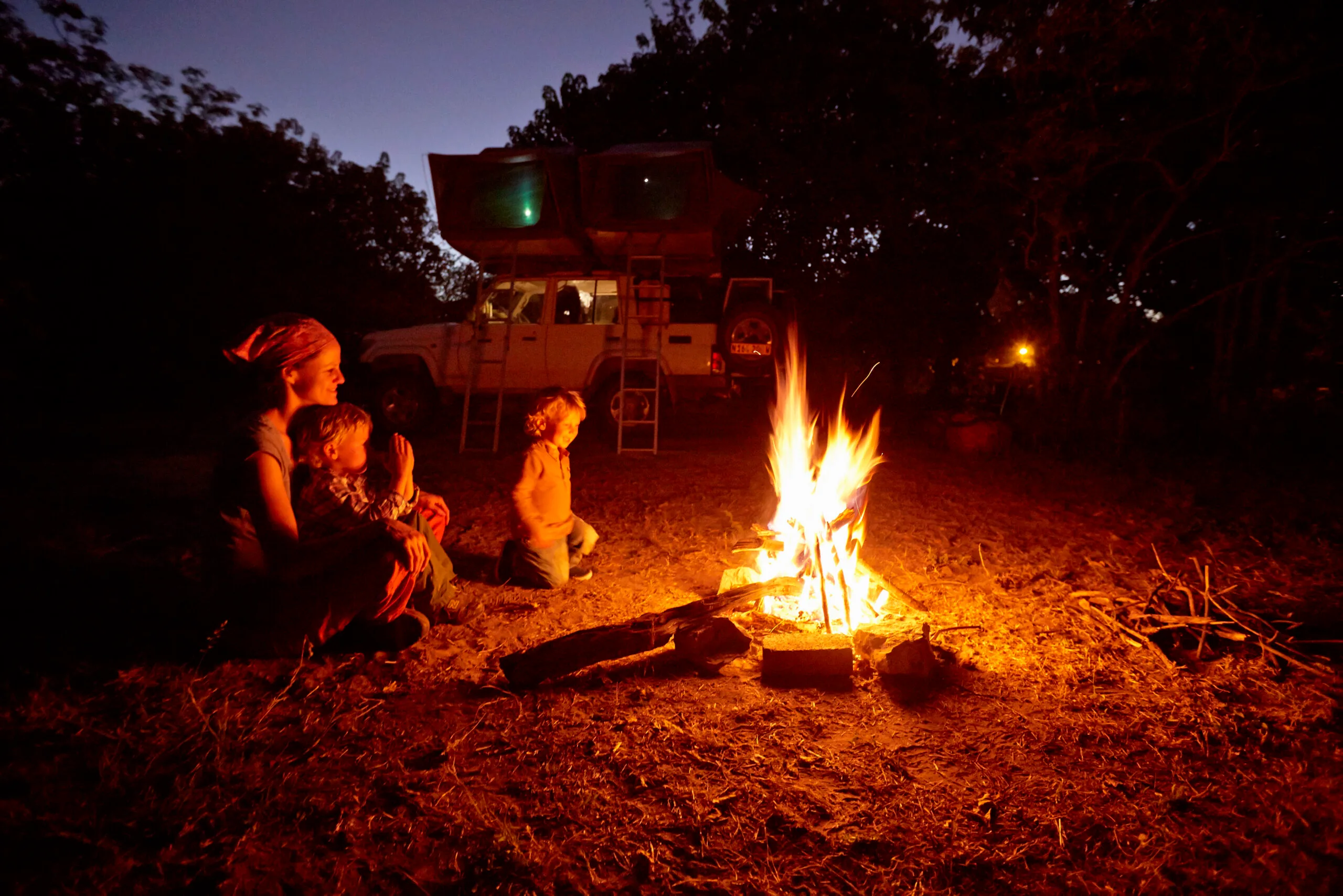 family enjoying a campfire under the night sky 2024 07 08 18 33 04 utc scaled