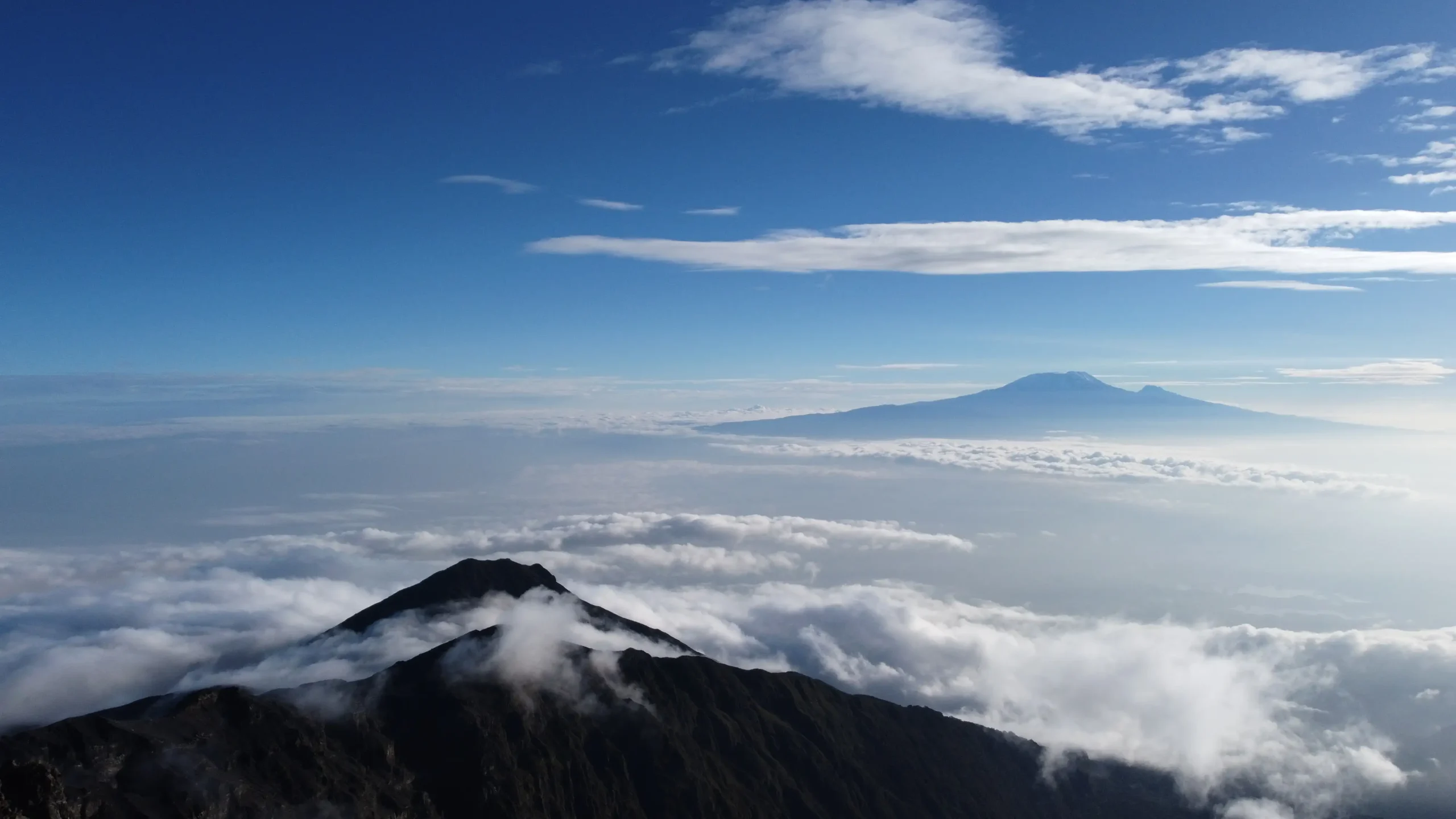 Spectacular view of glaciers at the summit of Mount Kilimanjaro, Tanzania, overlooking the surrounding landscape from Africa's highest peak.