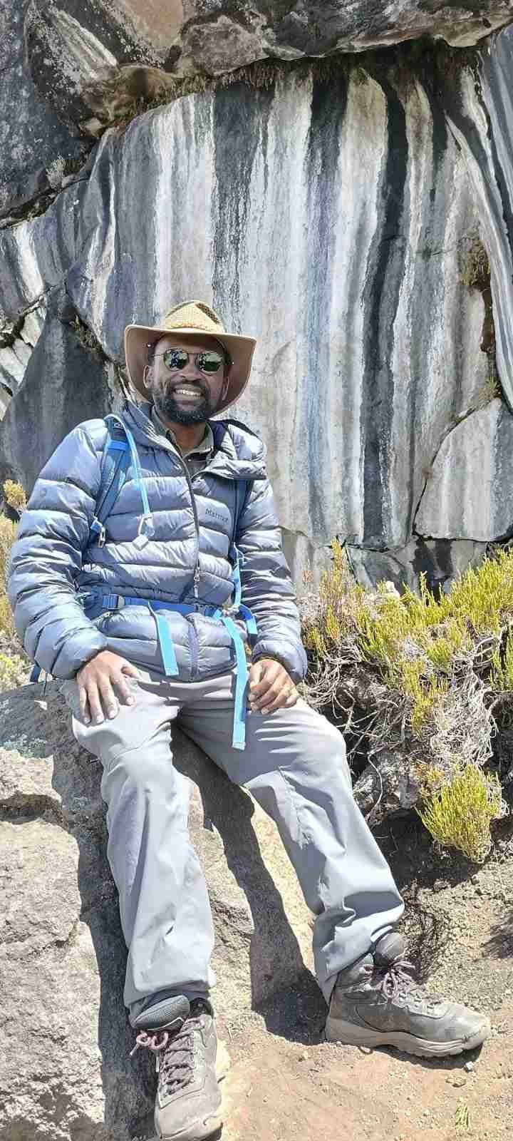Praise Nyange, founder of Nyange Adventures, on the slopes of Mount Kilimanjaro